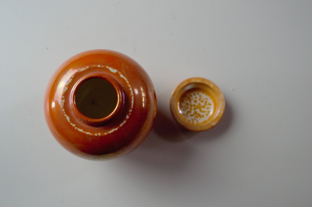 Ruskin Pottery Orange Lustre Ginger Jar.