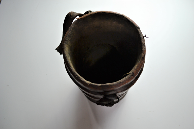 Early 20th century leather cordite carrier.
