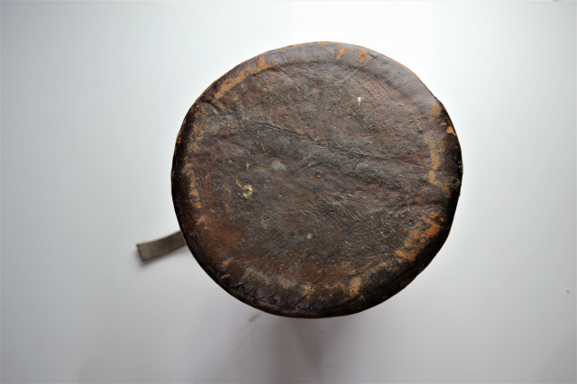 Early 20th century leather cordite carrier.