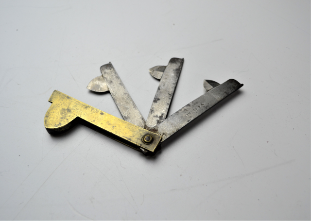 19th Century brass fleam knife by W. Searls.