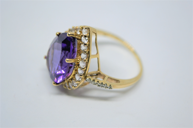 A 9ct Gold With Large Pear Cut Amethyst And CZ Ring.
