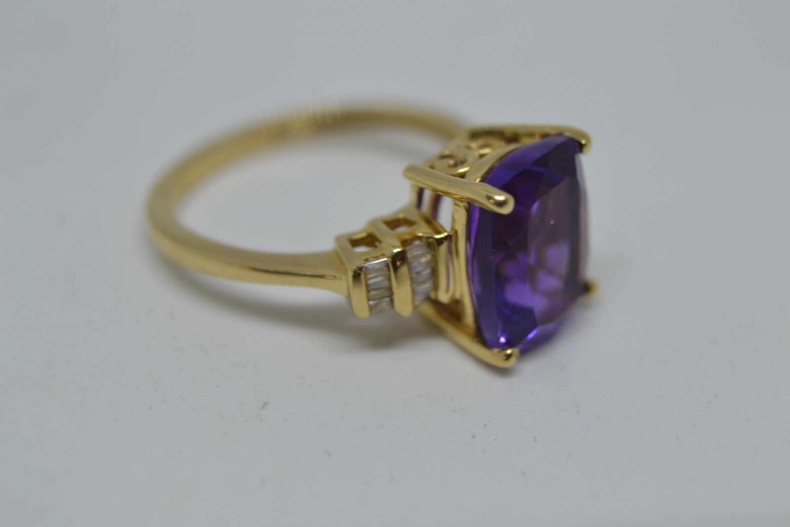A 9 ct Cushion Cut Amethyst And Diamond Ring