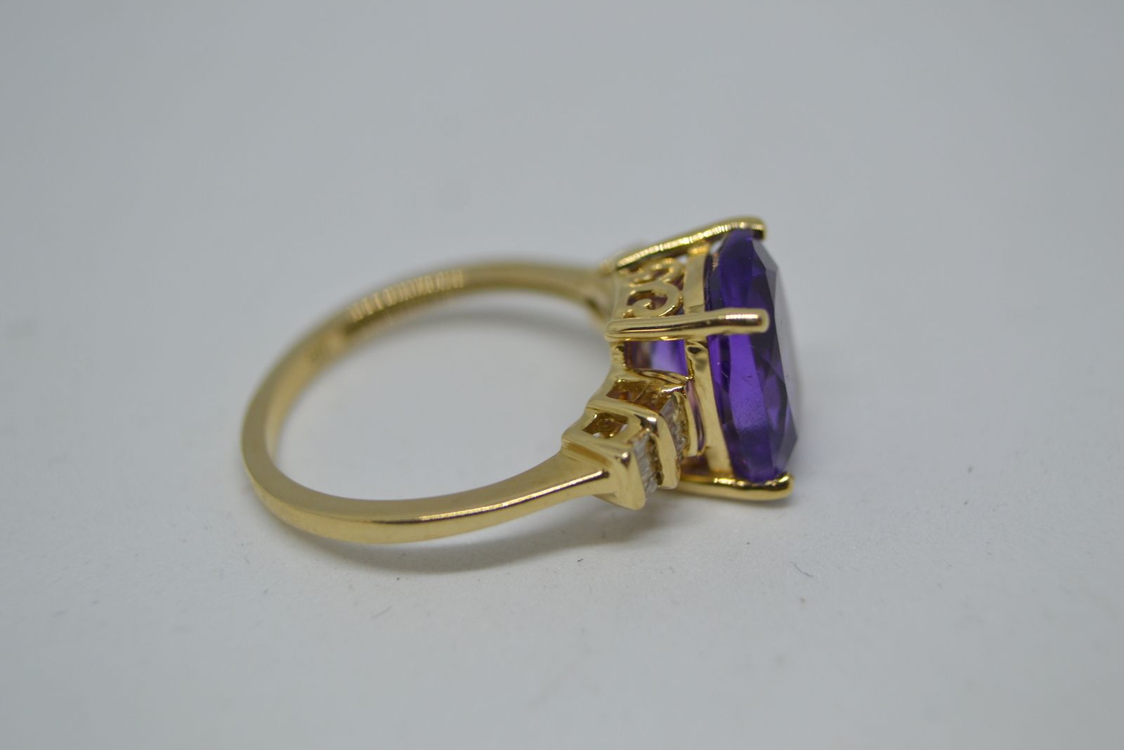 A 9 ct Cushion Cut Amethyst And Diamond Ring