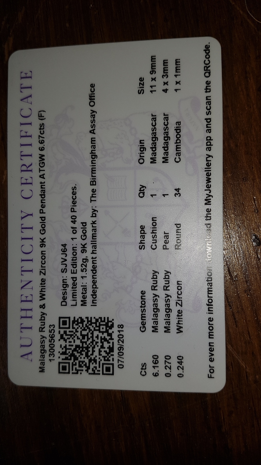 9ct White Gold Pear Shape Ruby And Zircon Pendant And The Certificate