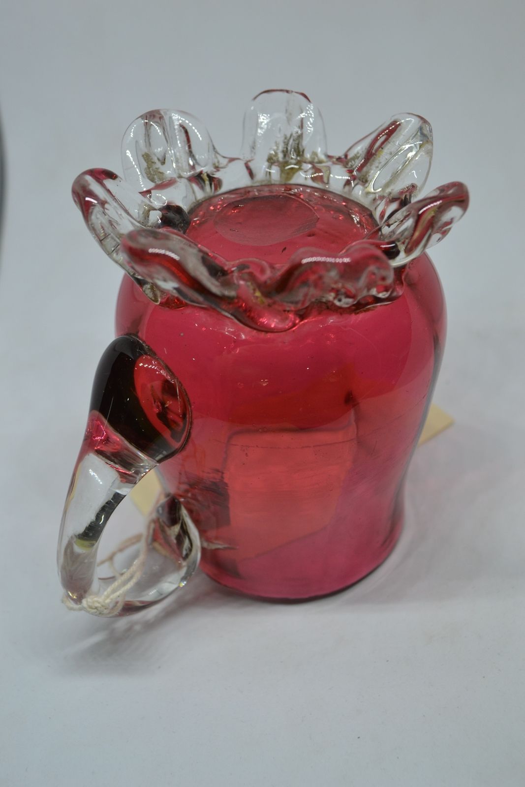A Cranberry Milk Jug, circa 1860.