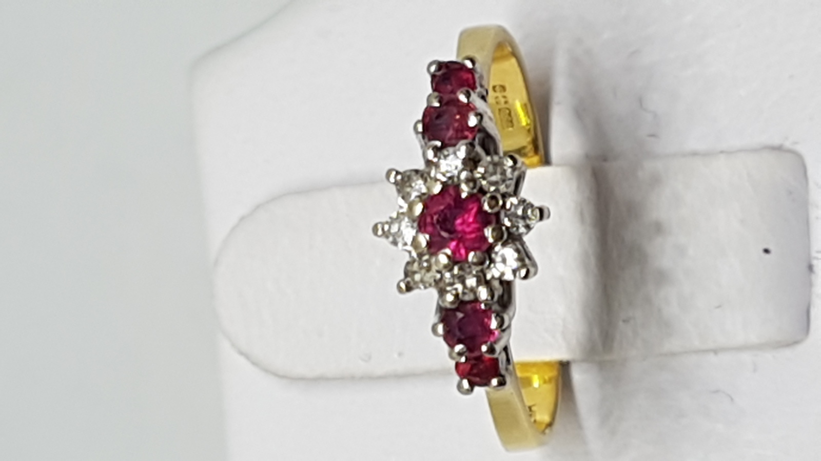 An 18 Ct Gold Ruby And Diamond Dress Ring