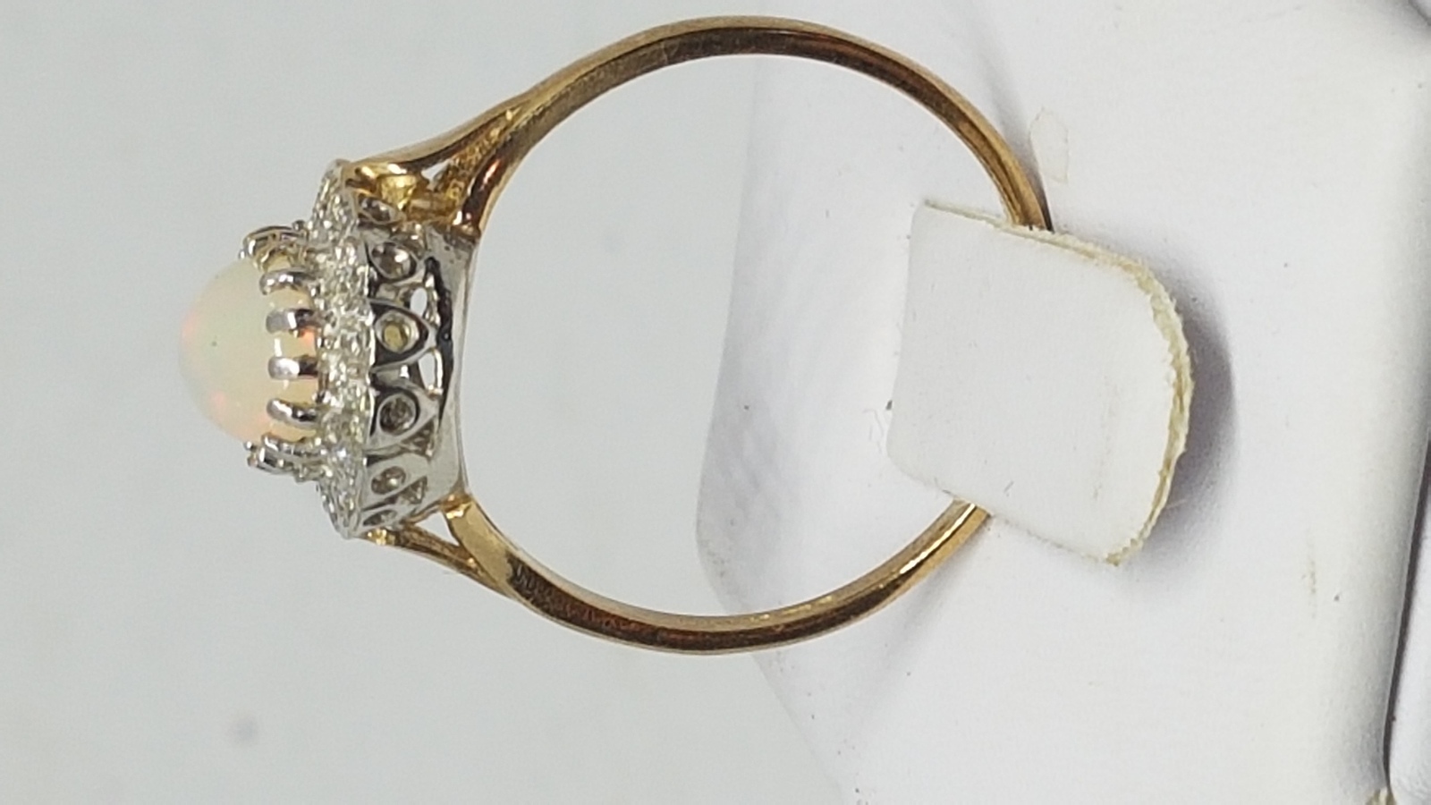 A 9 ct Gold Opal And Diamond Cluster Ring