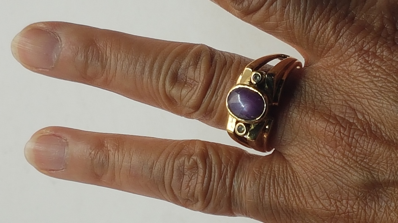 A 9ct Gold Star Ruby Dress Ring