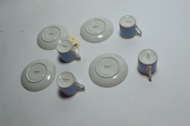 Four Demitasse Coffee Cups and Saucers.