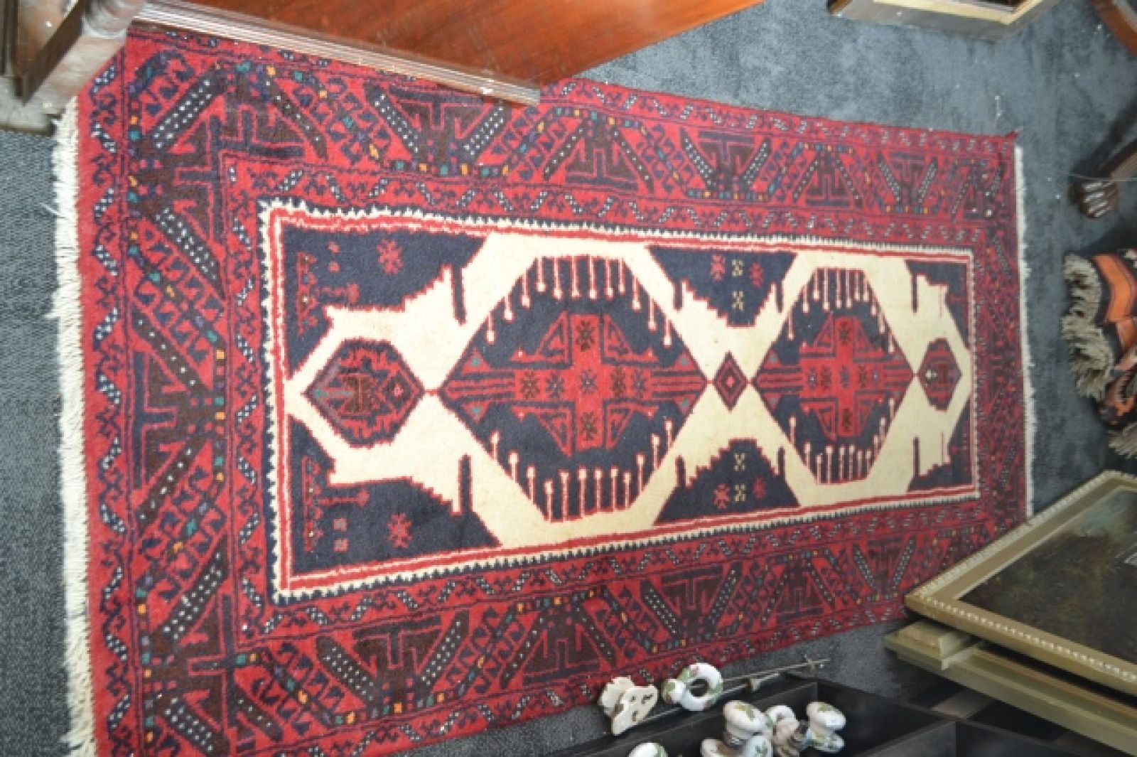A large Afghan Carpet.