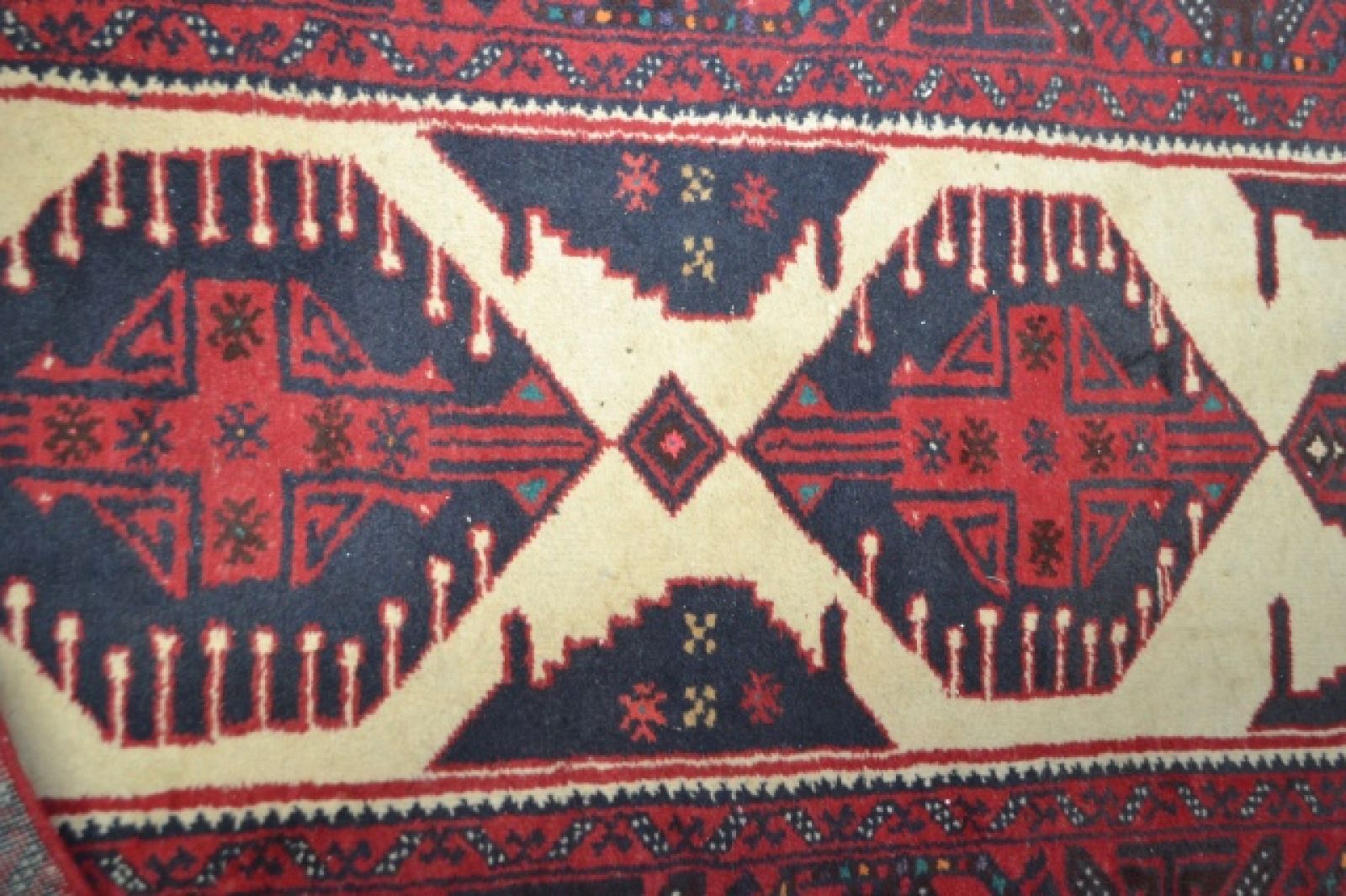 A large Afghan Carpet.